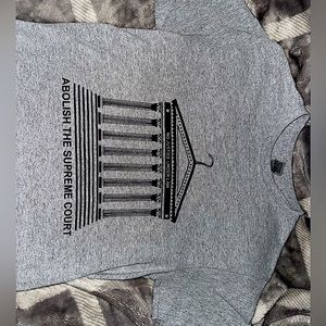 Gildan, small sized gray unisex t-shirt with “ABOLISH THE SUPREME COURT” wording